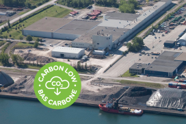 Aerial view on Montreal plant with a green logo that says Carbon Low