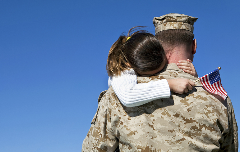 Photo of veteran with child