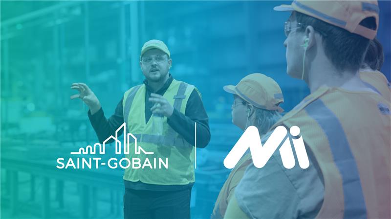 /Saint-Gobain%20and%20Manufacturing%20Institute%20Logos%20over%20image%20of%20plant%20employees