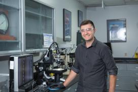 A happy employee who secured an entry level job in manufacturing at Saint-Gobain North America.