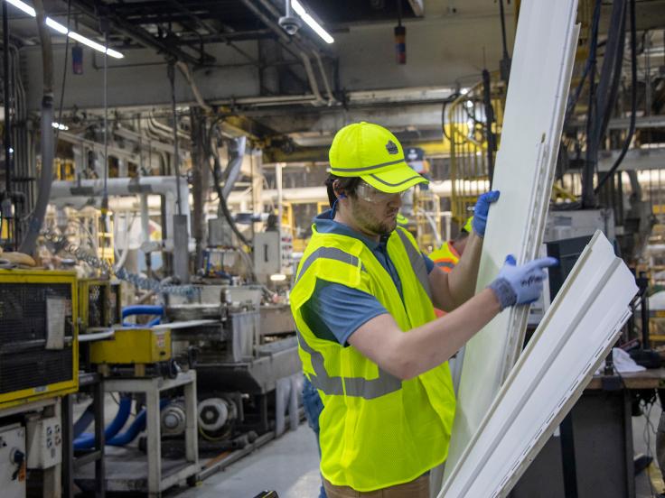 Engineer tests siding products as part of Essentials of Manufacturing, the engineering development program at Saint-Gobain North America